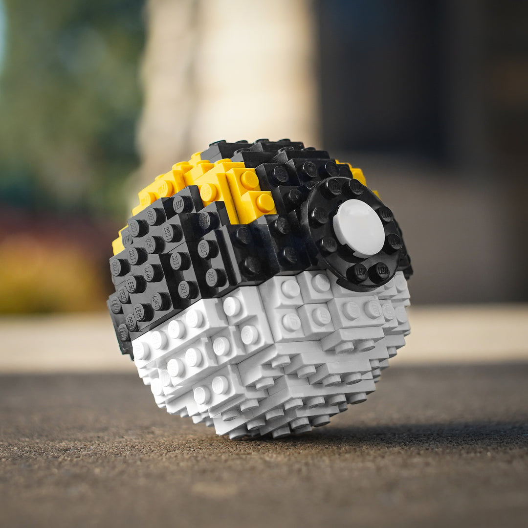 Ultra Pocket Sphere by Bricker Builds on street in LEGO Bricks Life-Sized Replica